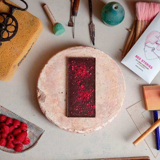 our dark chocolate with dried raspberries is named in honor of Wood's "Bed Stories."